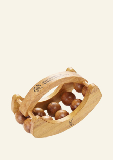 Masāžas aksesuārs ar rotējošu bumbiņu rindu